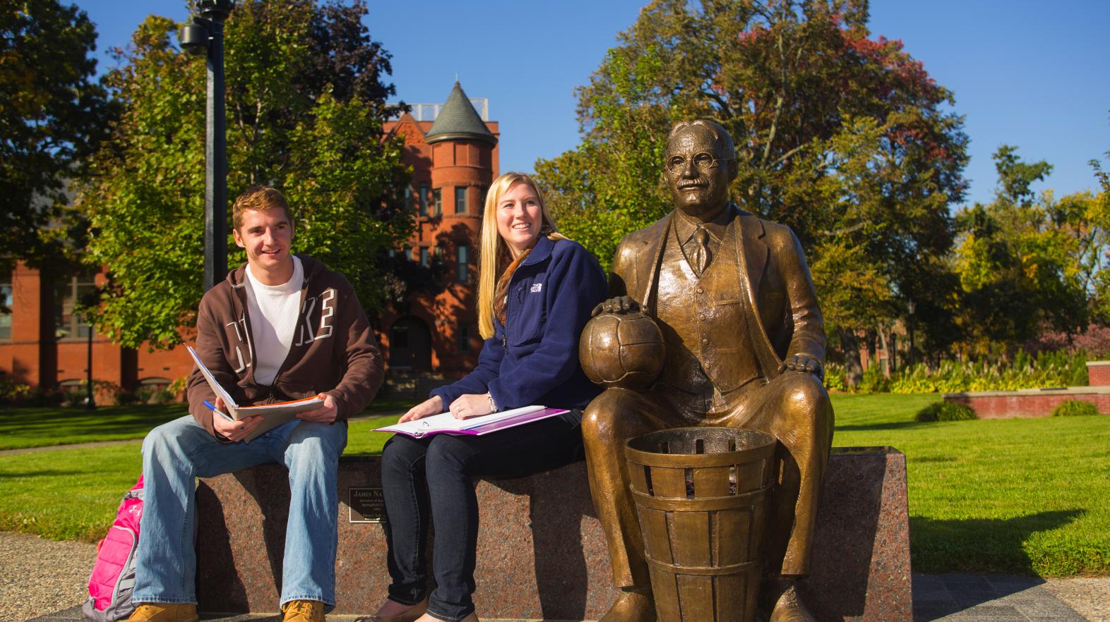 A larger-than-life bronze statue of James Naismith is unveiled on Naismith Green.