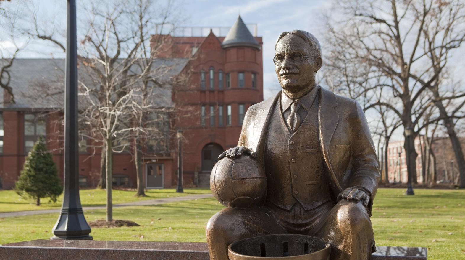 A statue of James Naismith, Springfield College alumnus and the inventor of basketball
