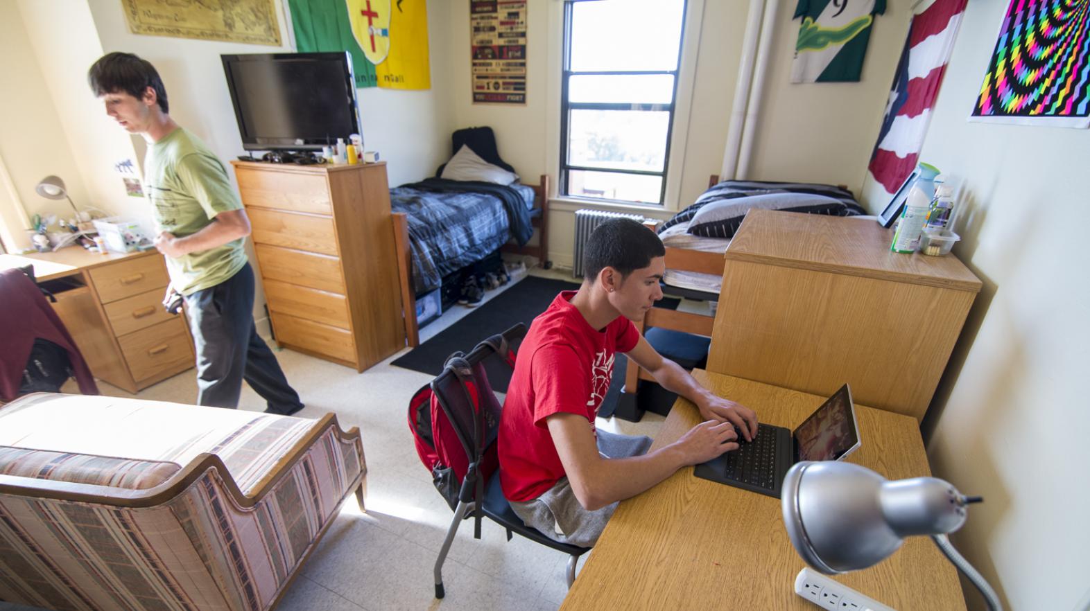 Students hang out in residence hall room