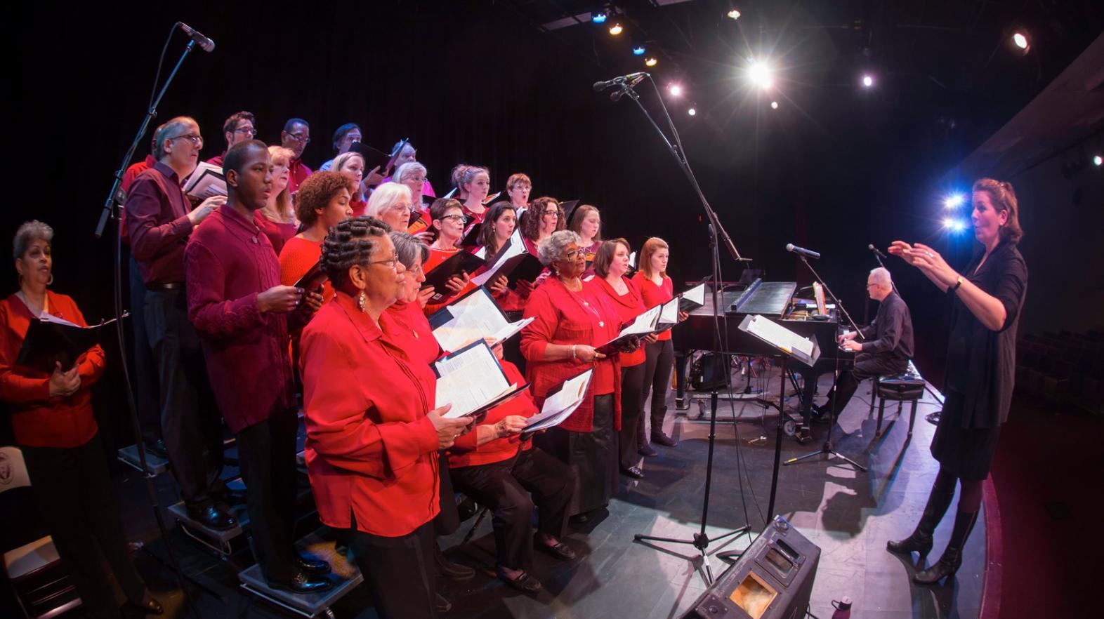 Students and community members sing at the Springfield College holiday concert