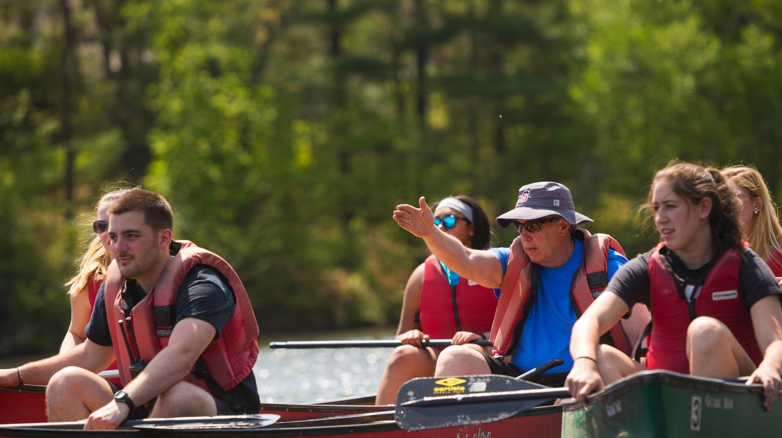 Students learn to canoe on Lake Massasoit during Outdoor Pursuits at Springfield College