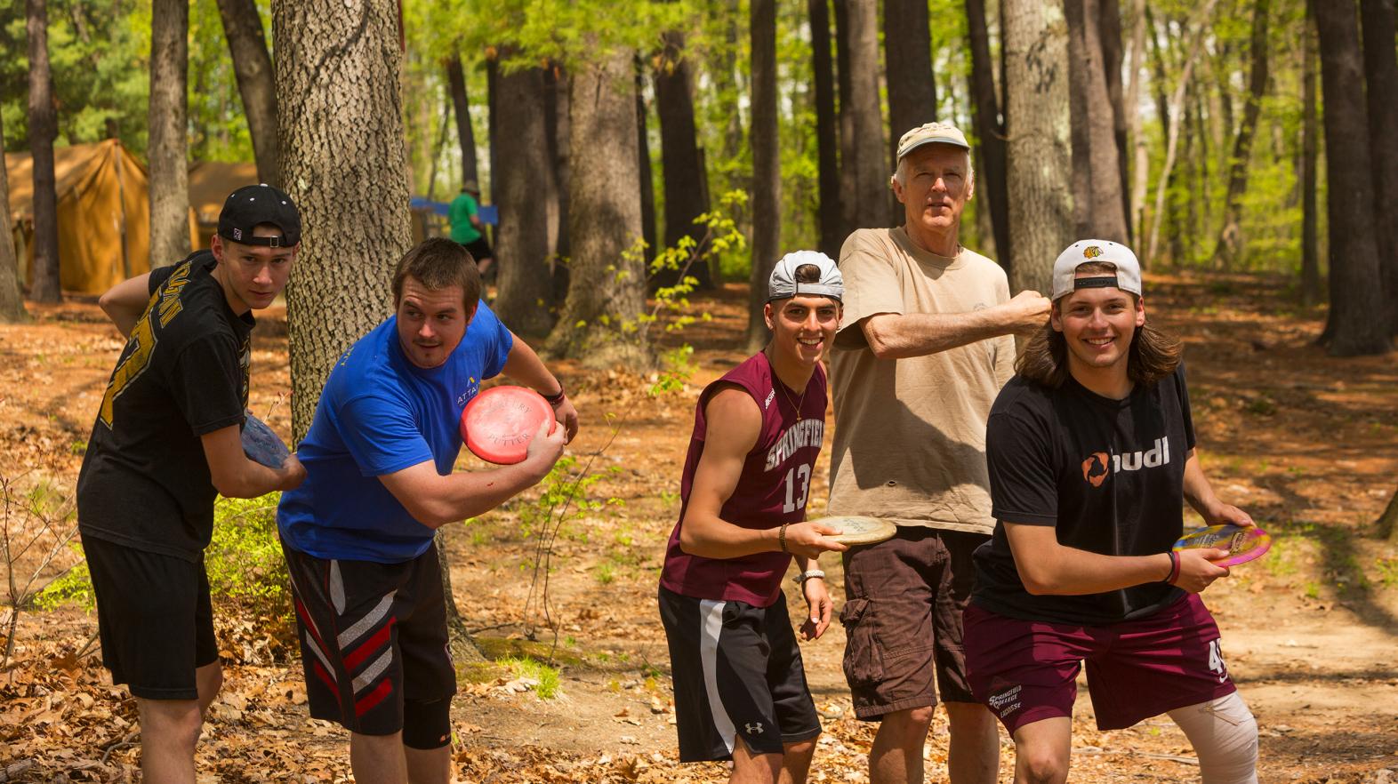 Students learn skills to play disc golf at East Campus during Outdoor Pursuits at Springfield College