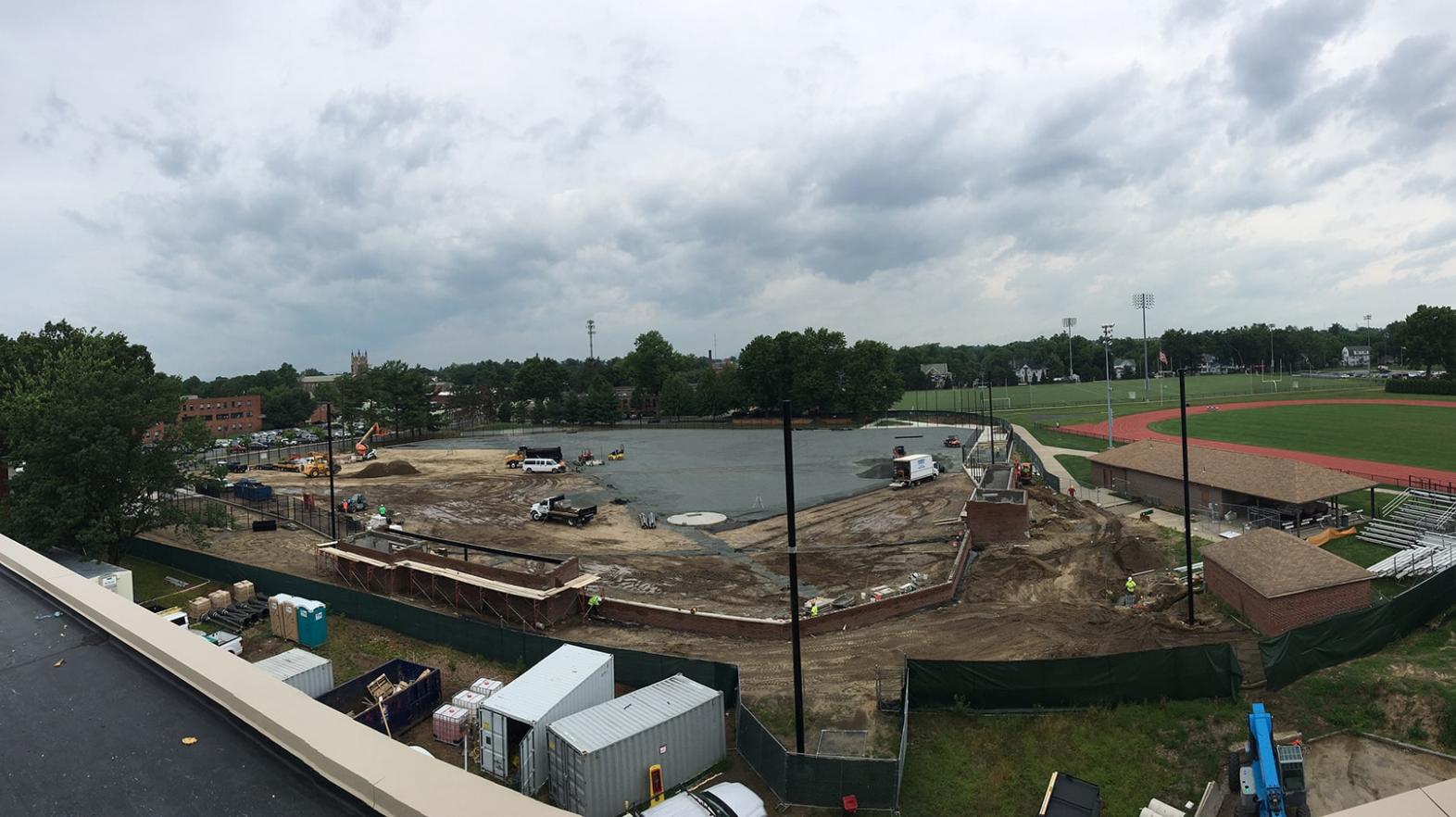 Knee wall, dugouts and field base fabric are being installed (7/13/17)