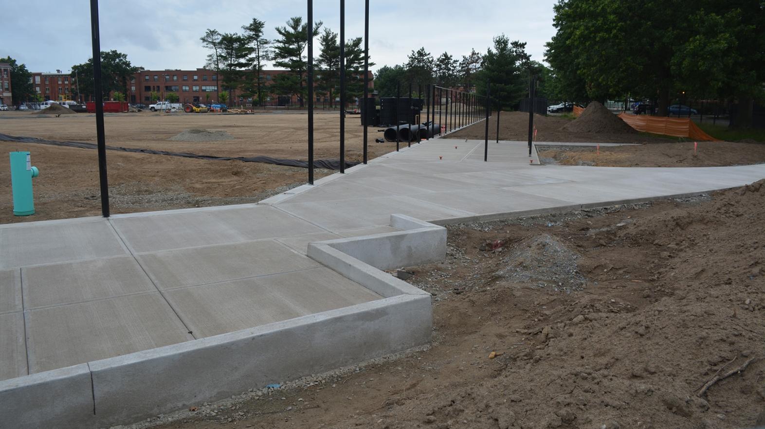 The walkway for the new adaptive field is poured and ready. (June 2017)