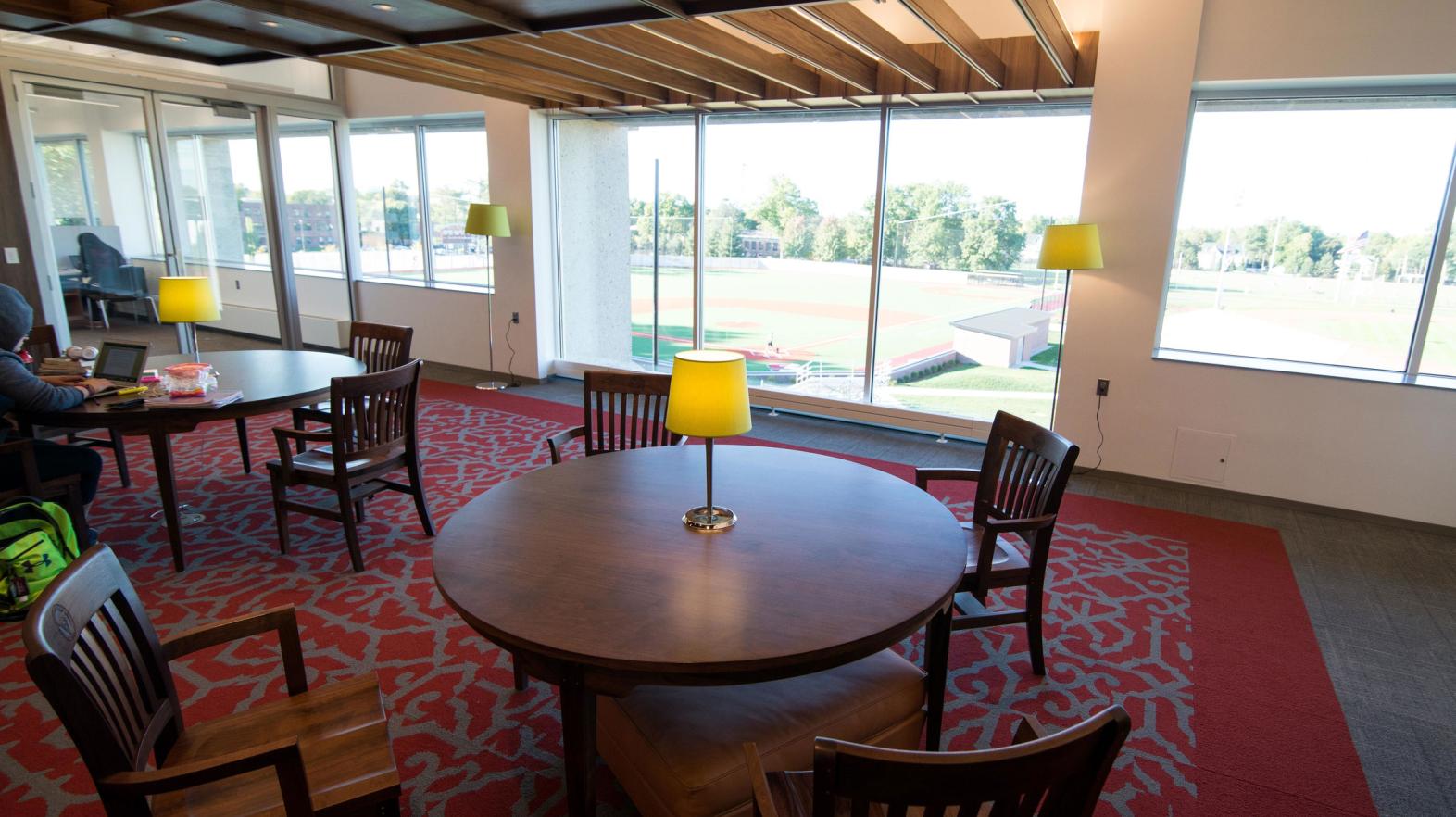 A table and layout of the Karpovich Room, located in the Learning Commons. 