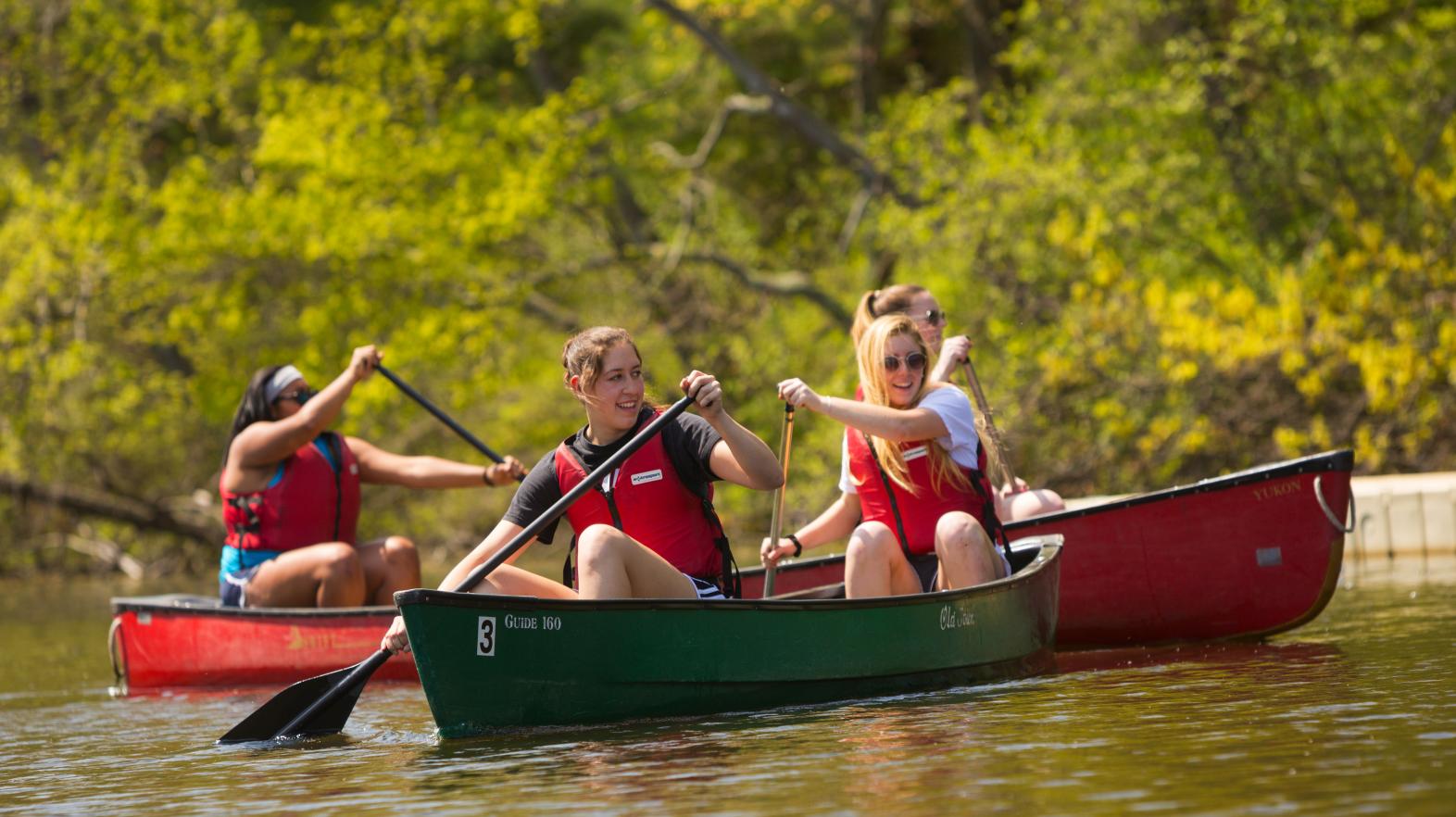 Students in kayaks out at East Campus. 