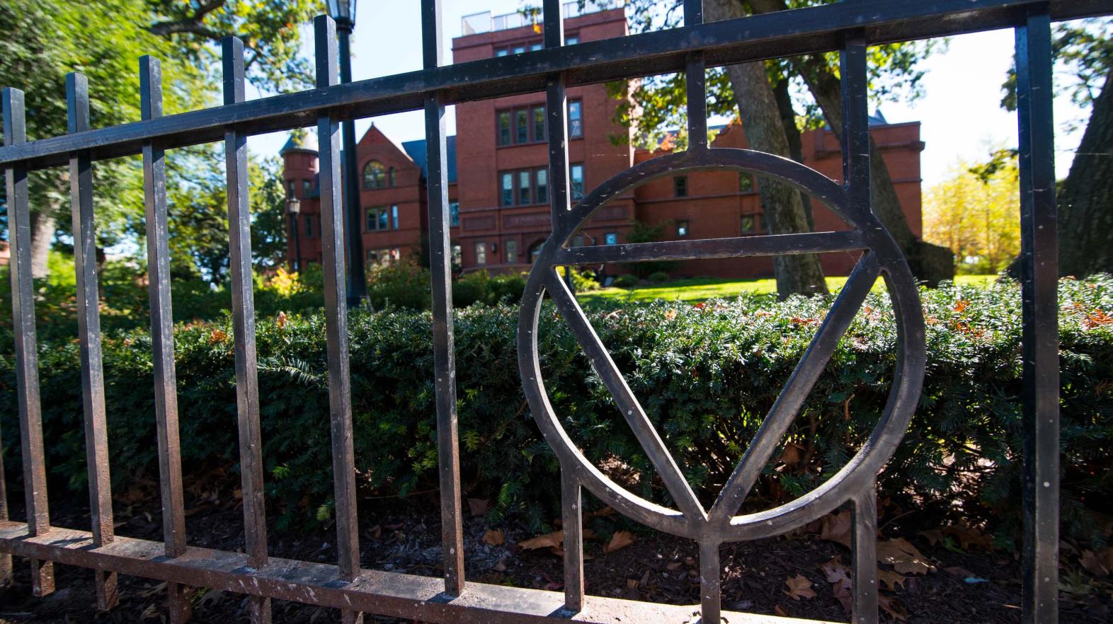 Triangle in a fence outside Judd Gymnasia.