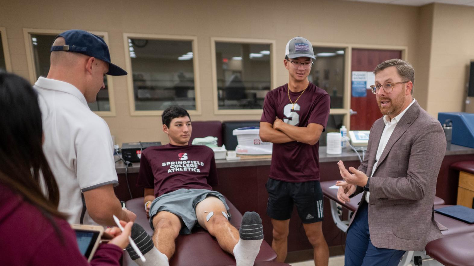 Springfield College Athletic Training Clinic rehab room student demonstration.