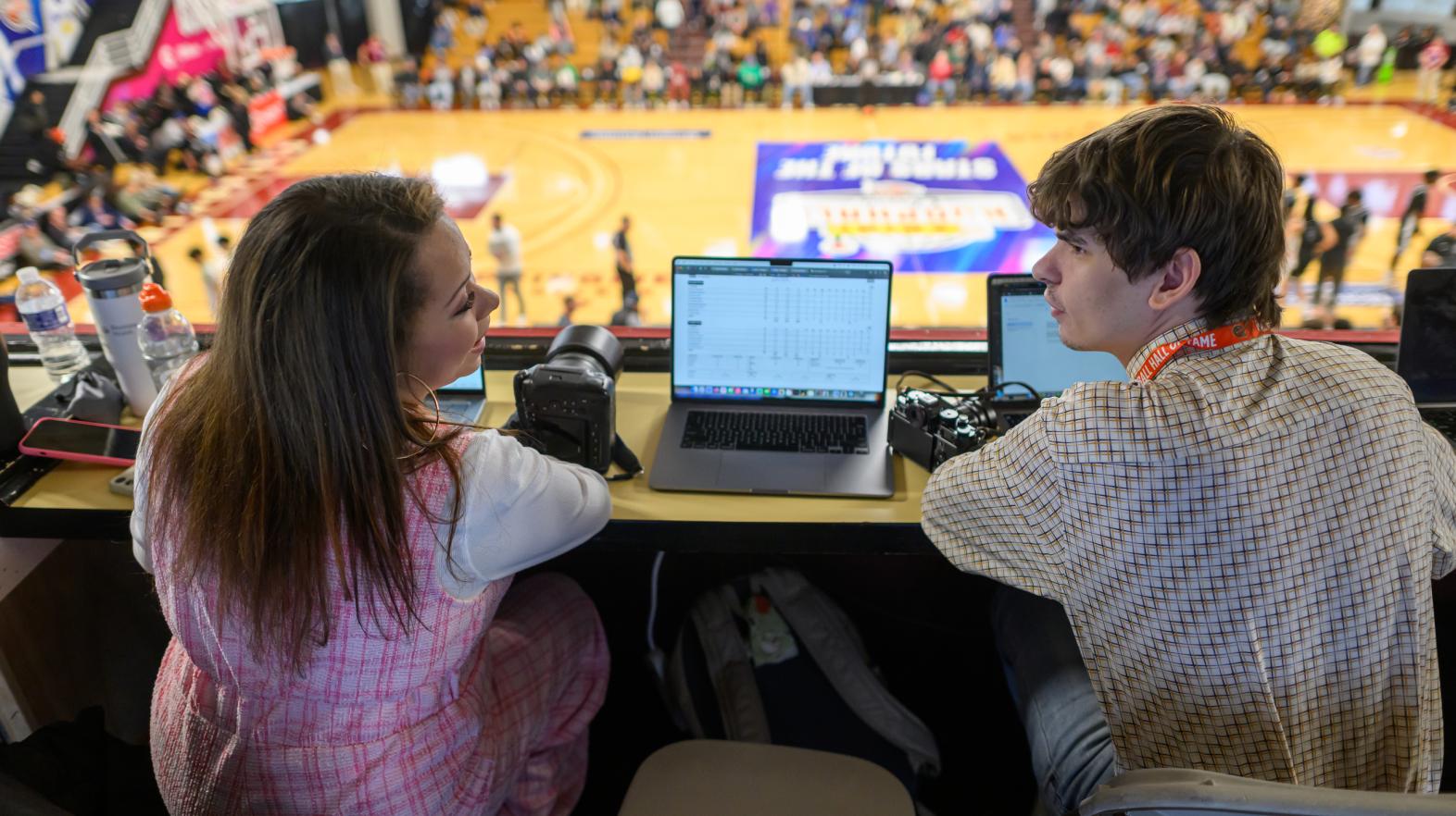 Communications and Sports Journalism students news gather and file reports during the Panini Hoophall Classic at Blake Arena on the Springfield College campus during the 24th annual premier high school basketball showcase in mid-January, 2026.