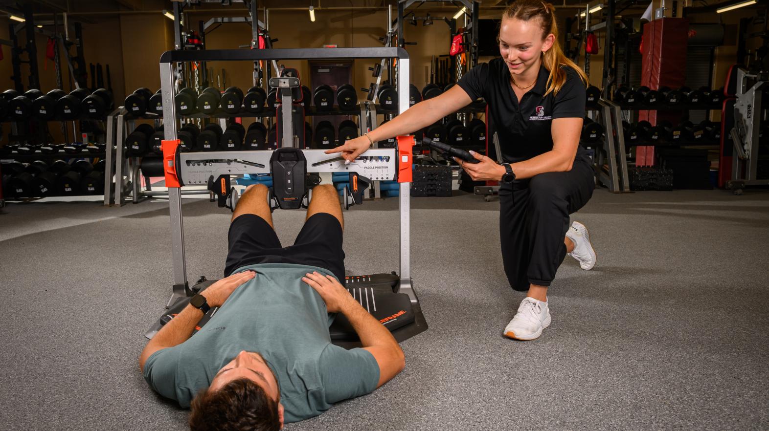 Springfield College Strength and Conditioning graduate students conduct testing in the varsity weight room on September 12, 2025.