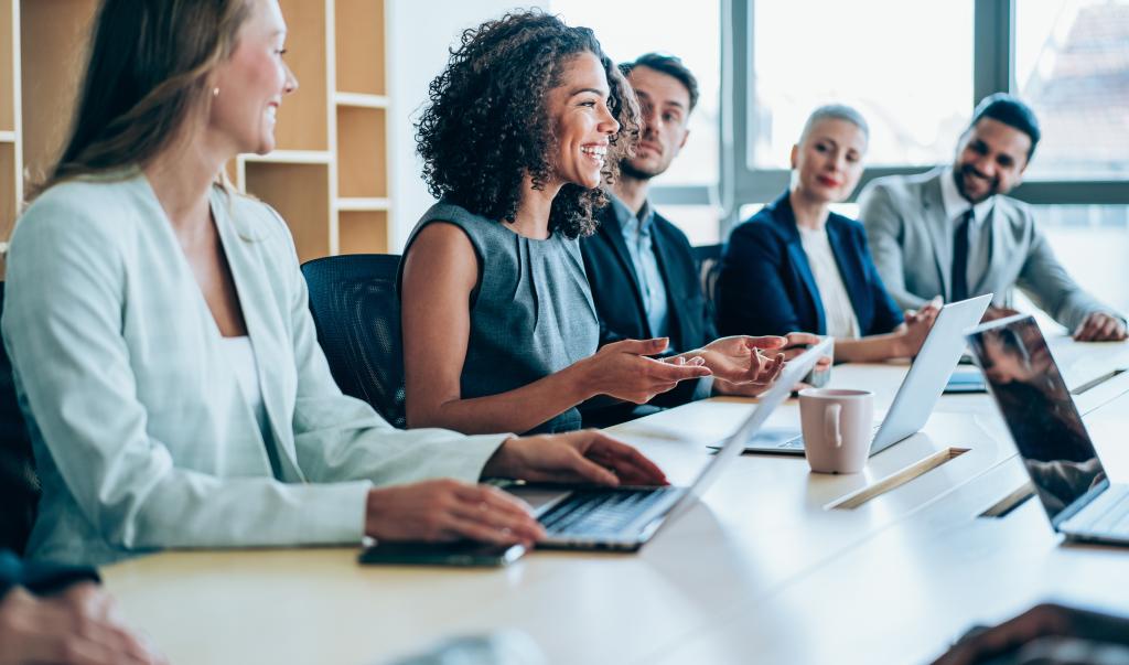 Group of business persons in business meeting. Group of entrepreneurs on meeting in board room.