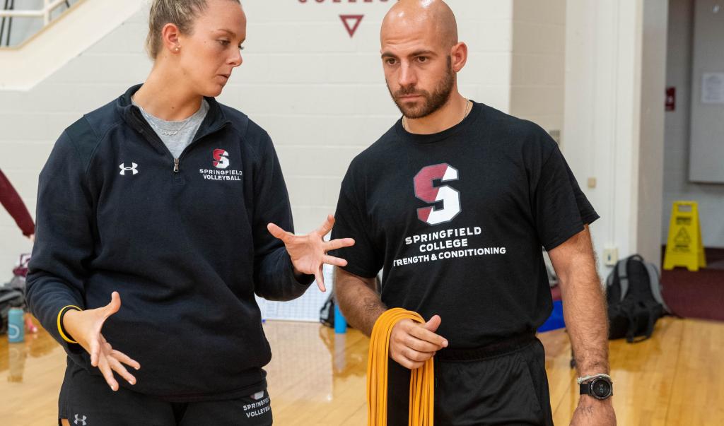 Springfield College Women’s volleyball graduate assistant coach Camryn Bancroft, a student in the Athletic Leadership graduate program conducts a workout
