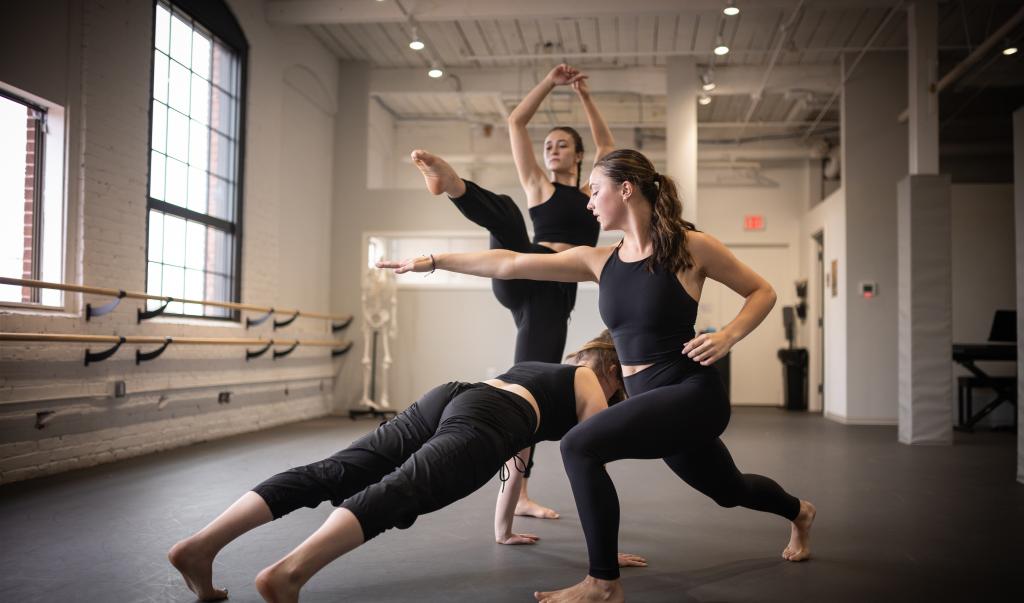 Students practicing in the dance studio