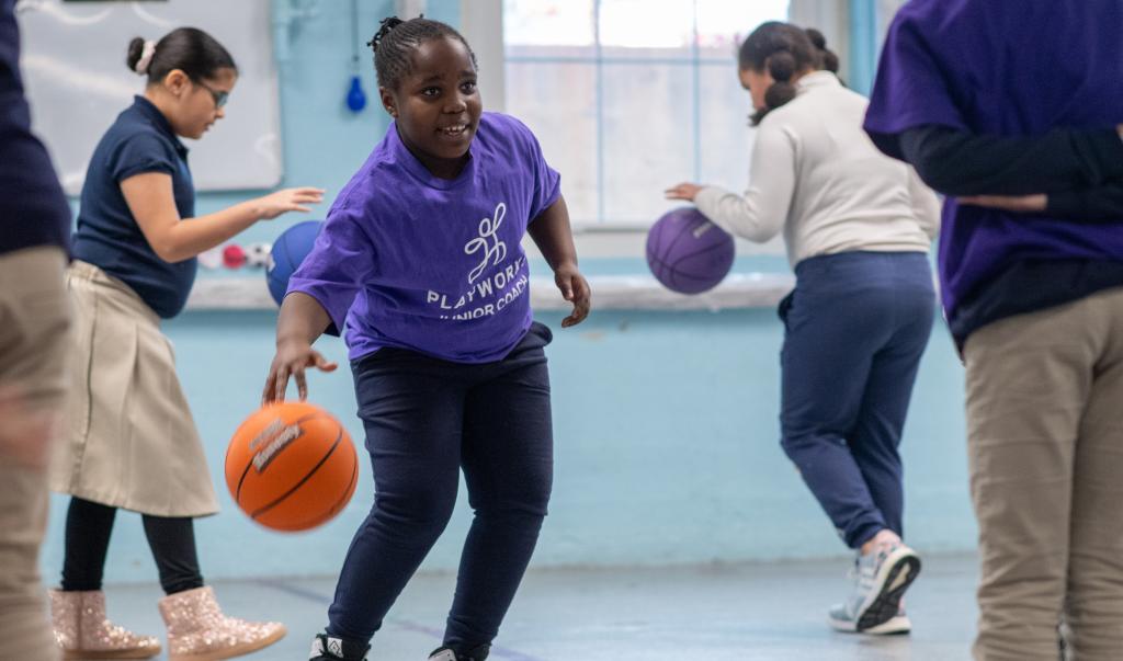 Springfield College student and AmeriCorps program member Caitlin Schult, an athletic counseling major, teaches a physical education class at White Street Elementary