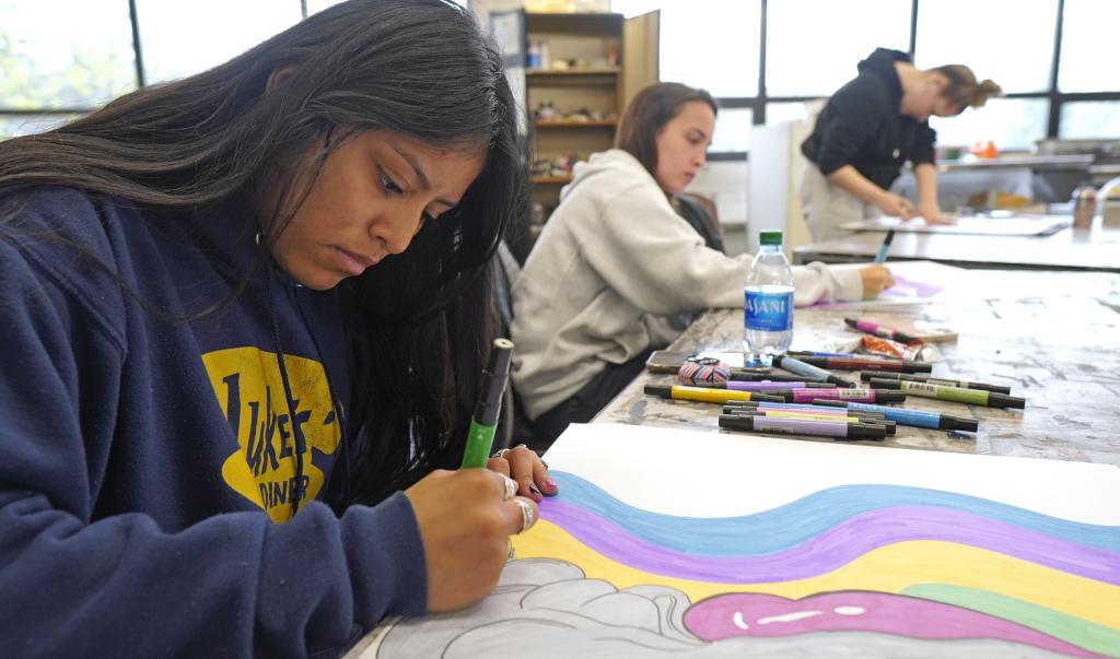 Students work during an art and design studio drawing course with professor Jessica Poser in Blake Hall