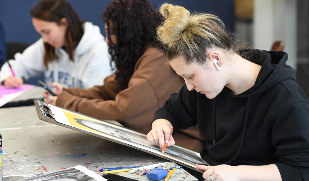 Students work during an art and design studio drawing course with professor Jessica Poser in Blake Hall