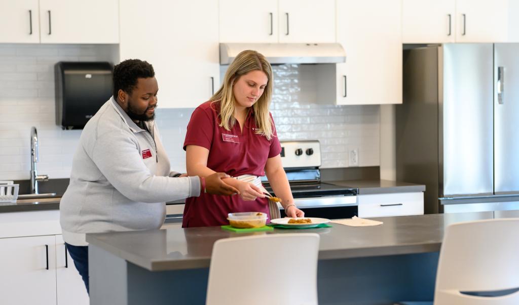 Springfield College Occupational Therapy students work in the Activities of Daily Living Lab in the Health Sciences Center on November 8, 2023.