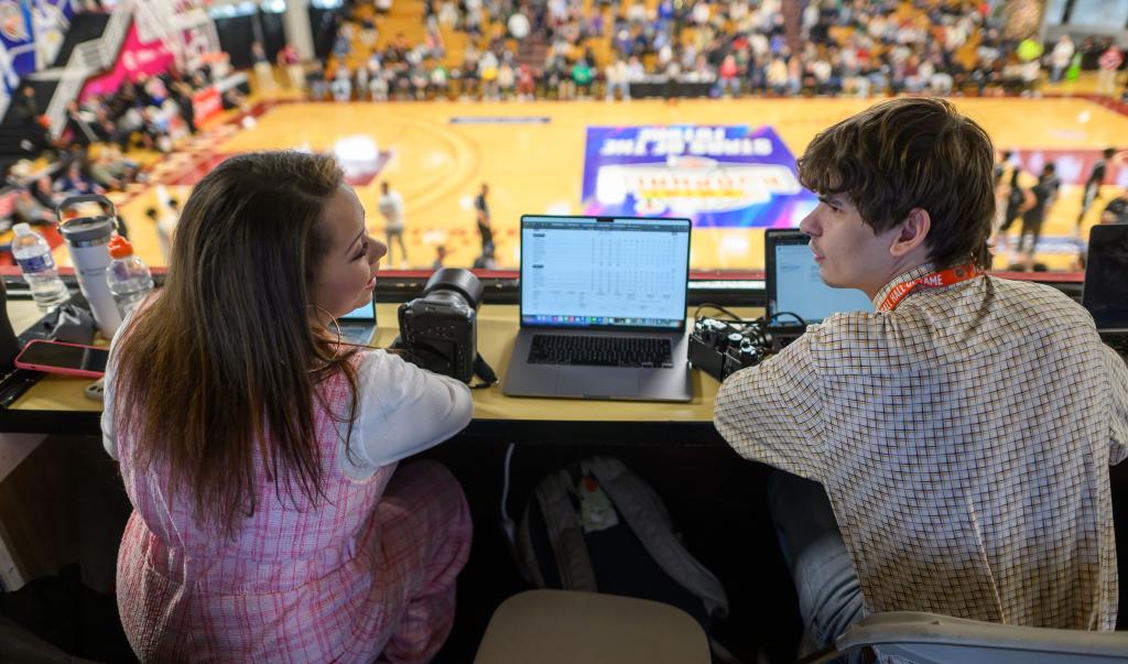 Communications and Sports Journalism students news gather and file reports during the Panini Hoophall Classic at Blake Arena on the Springfield College campus during the 24th annual premier high school basketball showcase in mid-January, 2026.