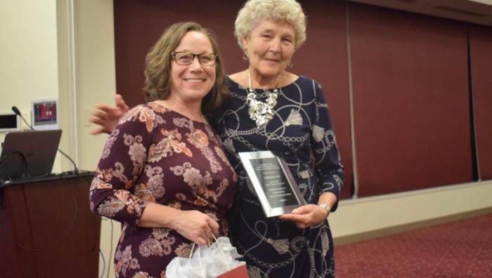 At left, Springfield College School of Physical Education, Performance and Sport Leadership Dean Tracey Matthews and 2019 Peter V. Karpovich keynote speaker Judith Rink